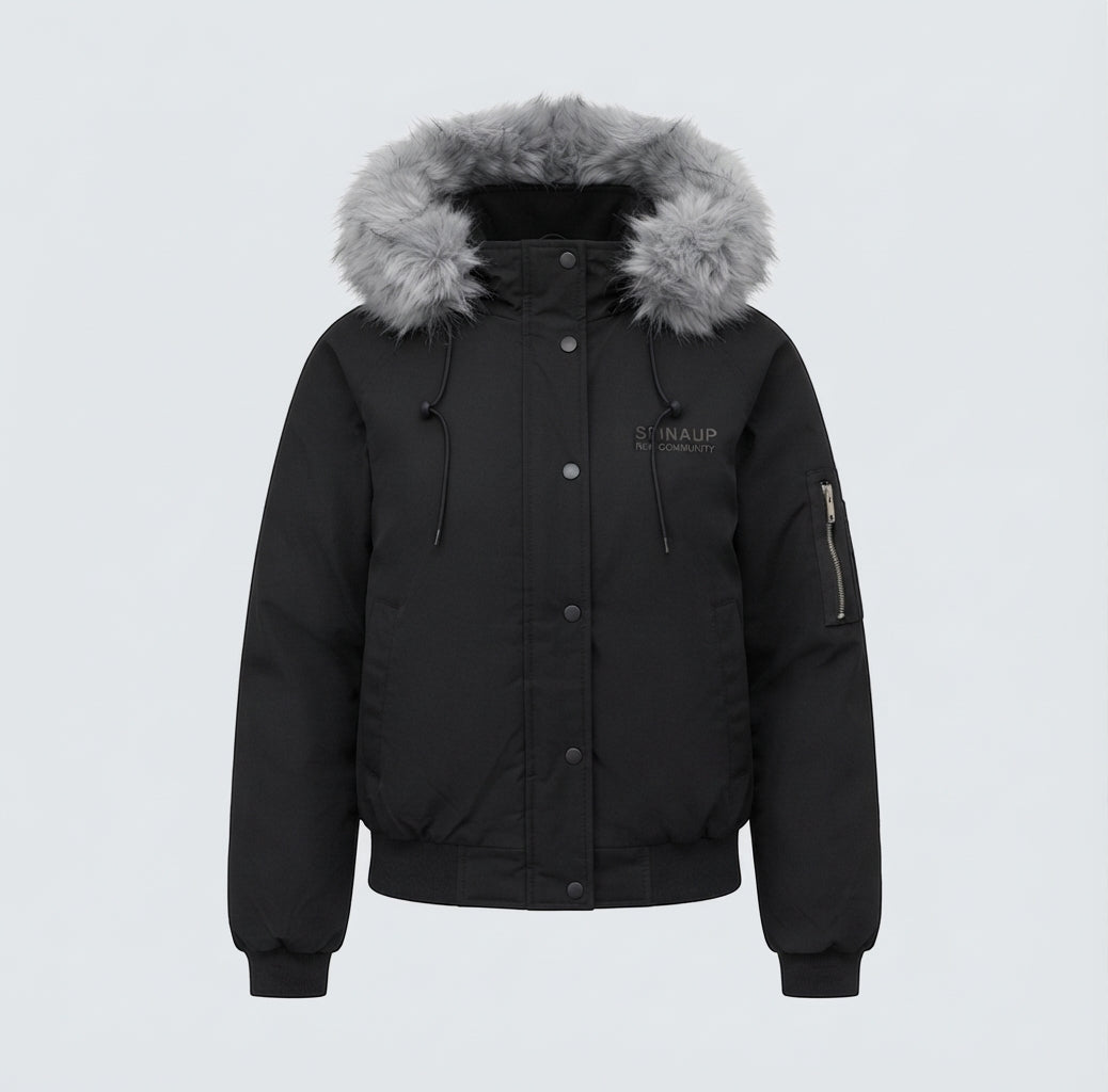 Women's short quilted city bomber with voluminous hood, drawstring, and windproof thermal lining