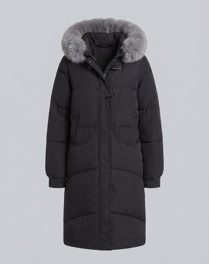 Women’s extra long oversized puffer coat with voluminous hood, removable faux fur trim, and noise-reducing outer material