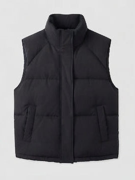 Women's non-padded thermal quilted vest with high standing collar, concealed two-way zipper, and practical flap pockets