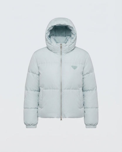 Women's short quilted boxy puffer with hood, adjustable hem and elastic cuffs