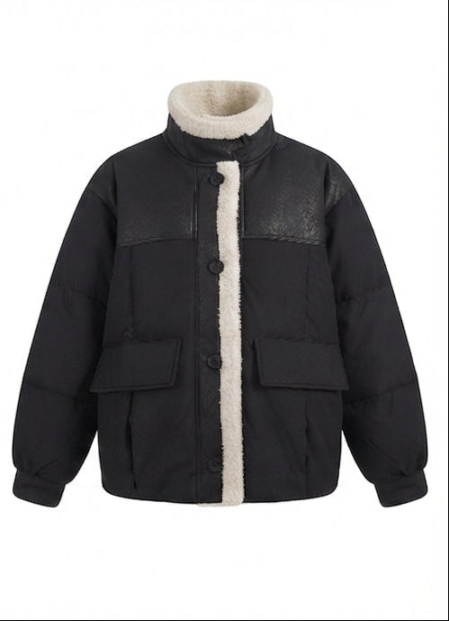 Women's short quilted bomber jacket with teddy lining, faux leather front panels, and patch pockets