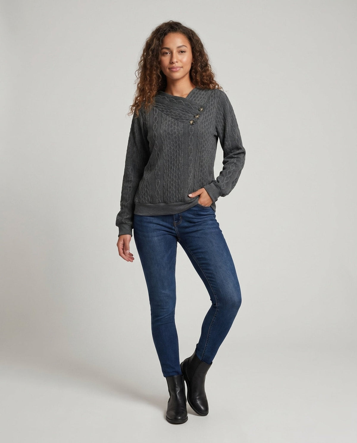 Women's knit sweater with diagonal button decoration and textured surface - Chichicherry