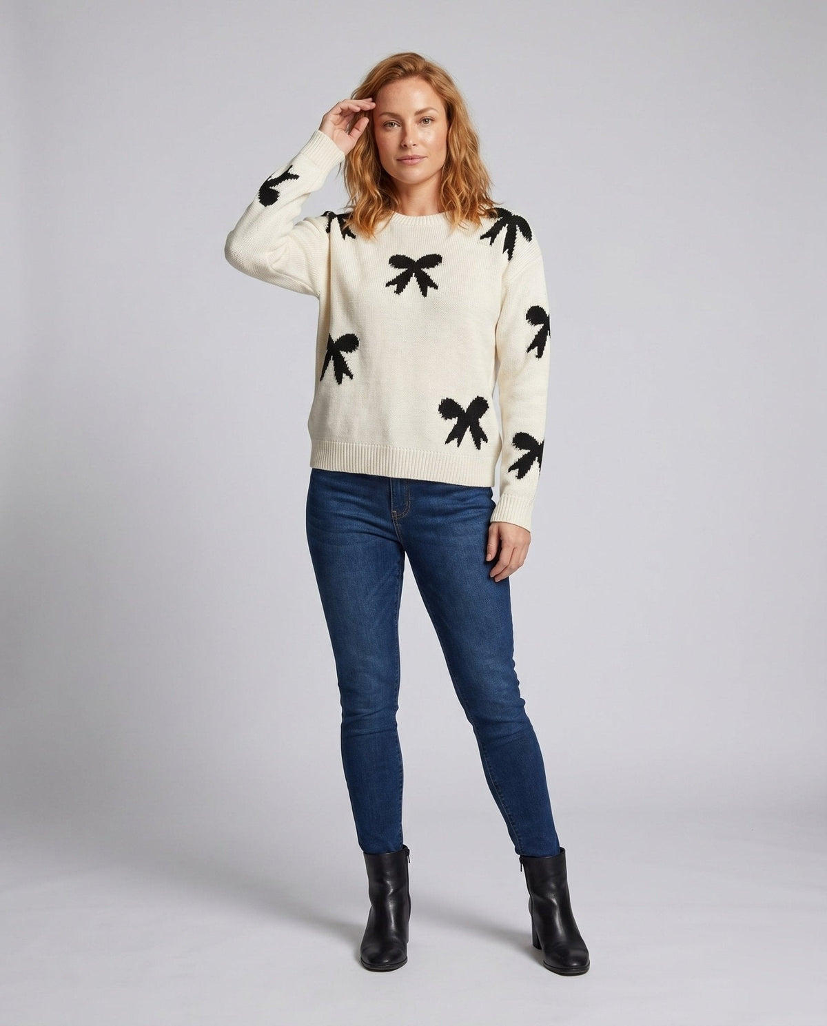 Women's knit sweater with playful bow motif and casual fit - Chichicherry